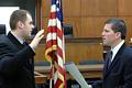 Dean swearing-in Parma Police Officer Michael Glem on January 18